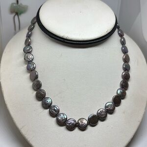 10mm grey color freshwater coin pearl necklace. Made with sterling silver clasp